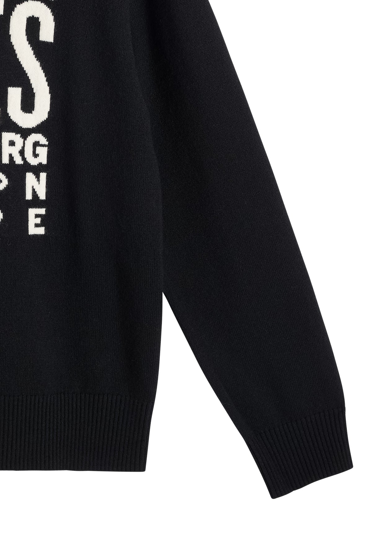Nærbillede: Sort William Knitted Sweater med hvid jacquard-strikket grafik og ribstrikkede kanter.