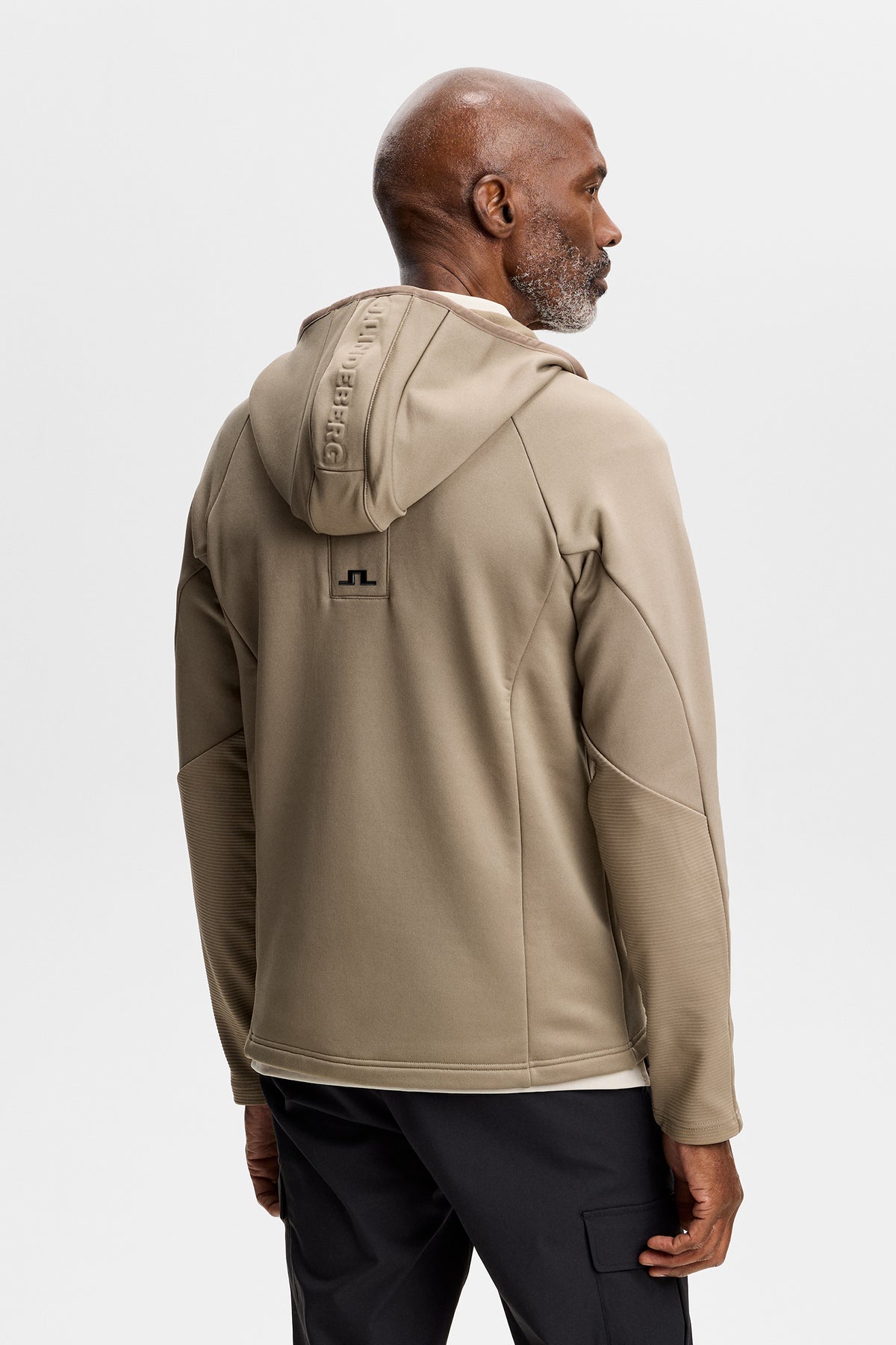 Vue de dos : Pollock Polartec Hood en Brindle avec logo Bridge au dos et empiècements texturés.