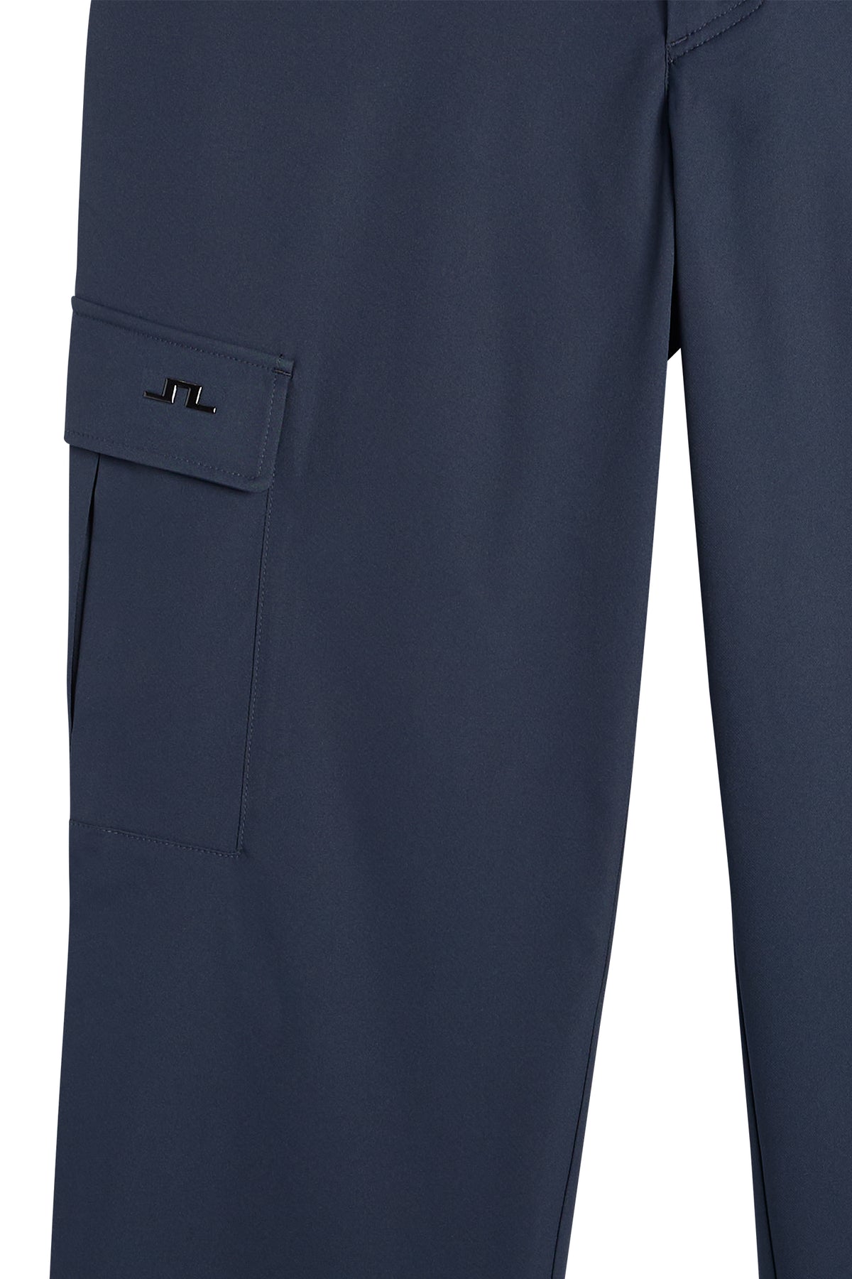 Logan Cargo Pant in JL Navy, close-up view of the side cargo pocket and metallic Bridge logo.
