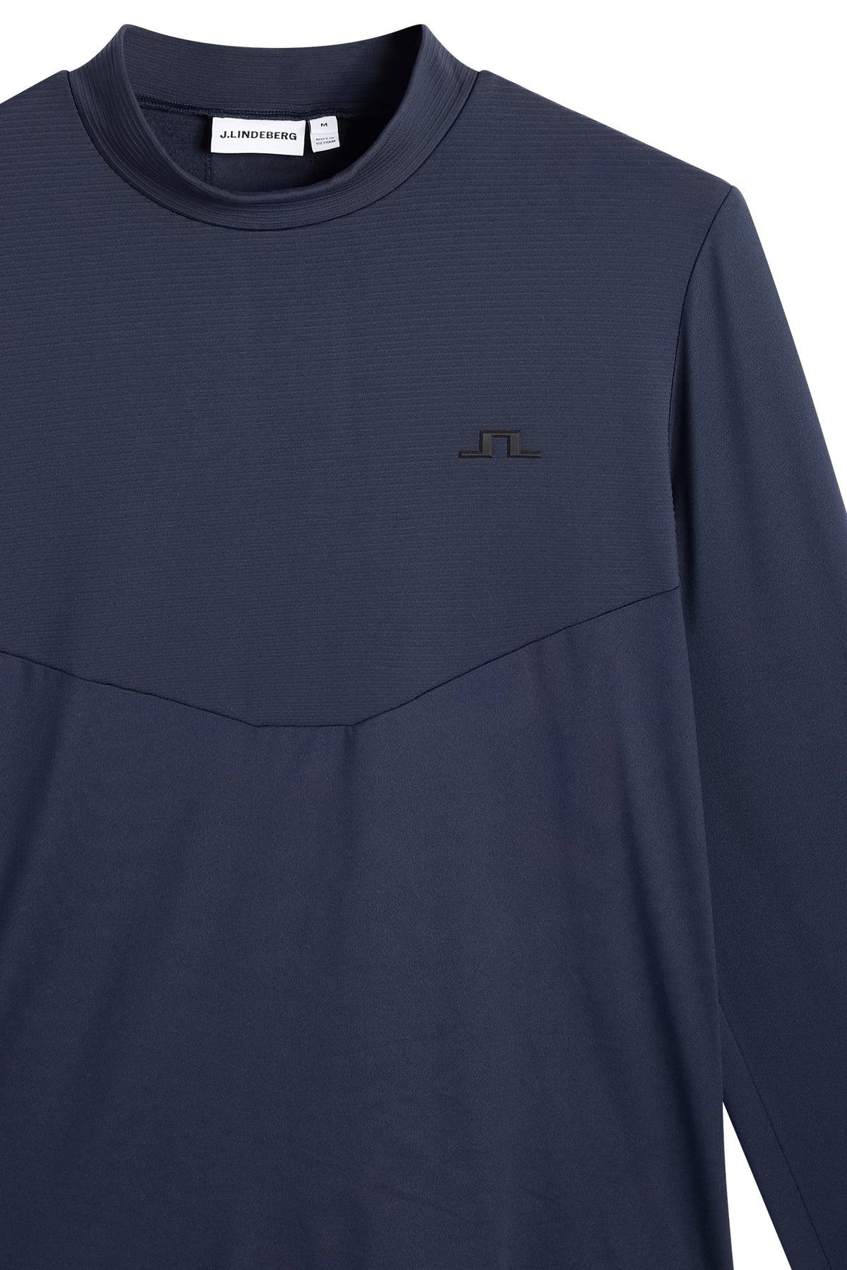 Close-up of the Zenit Baselayer Top in JL Navy, showing the high neck and chest Bridge logo.