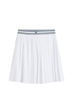 White pleated skirt with a blue and black striped waistband on a white background