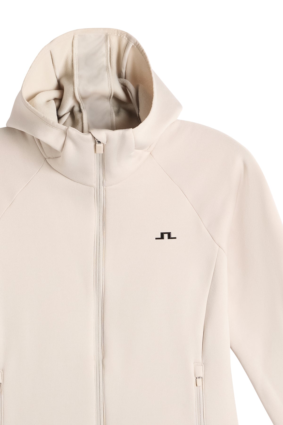 Close-up of Portia Polartec Hood in Moonbeam showing the hood, zipper, and chest Bridge logo.