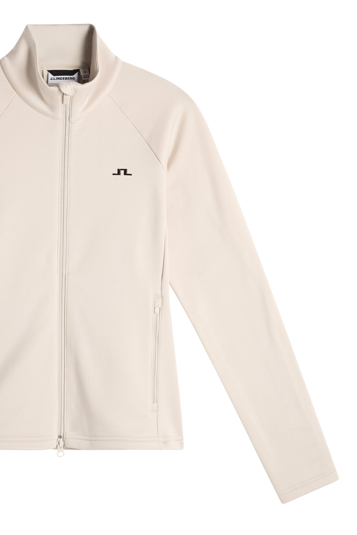 Close-up of the Portia Polartec Mid Layer in Moonbeam with high neck, front zipper, and Bridge logo on the chest.