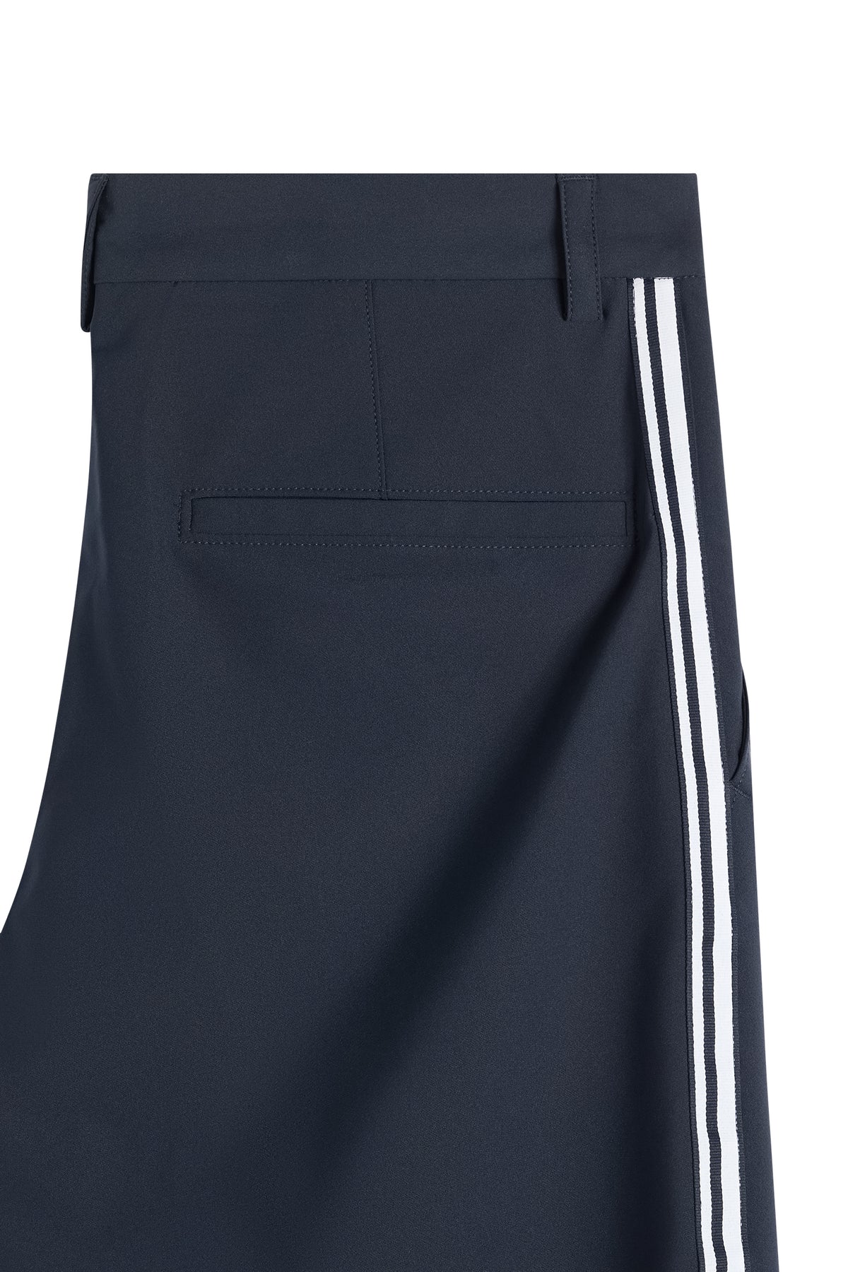 Close-up of the Mitch Stripe pant in JL Navy, showing a back welt pocket and white side stripe tape.