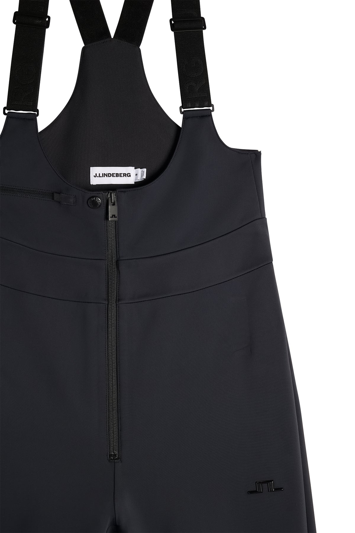 Close-up: Zwarte Aviana Softshell Bib Pant met ritssluiting aan de voorkant, verstelbare bretels en Bridge-logo.