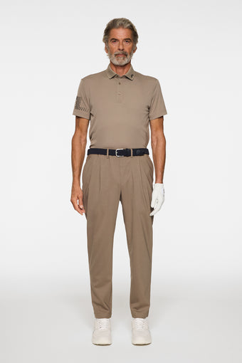 a man wearing a golf outfit