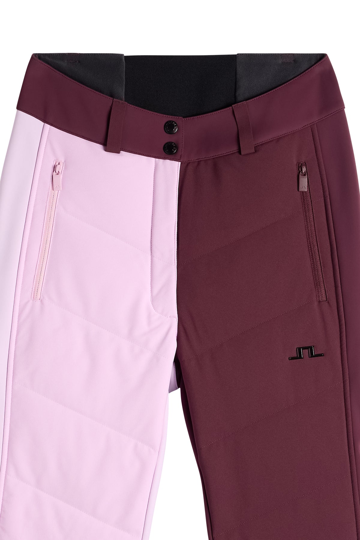 Detailansicht: Yara Blocked Down Pant in Winetasting mit Colorblocking, Reißverschlusstaschen und Bridge-Logo.