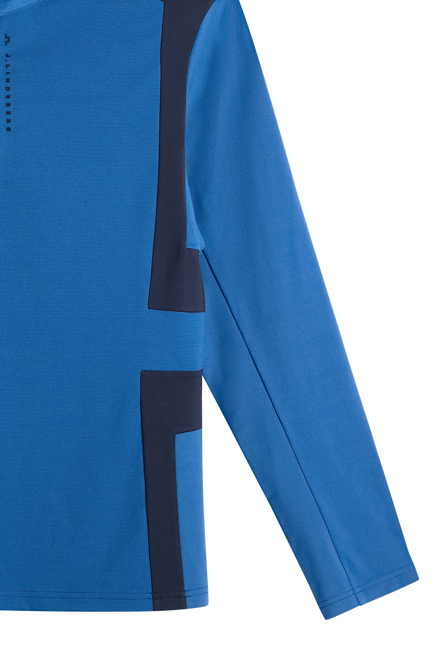 Close-up: Finn Quarter Zip Mid Layer in Set Sail met color-block panelen en subtiel J.Lindeberg-logo.