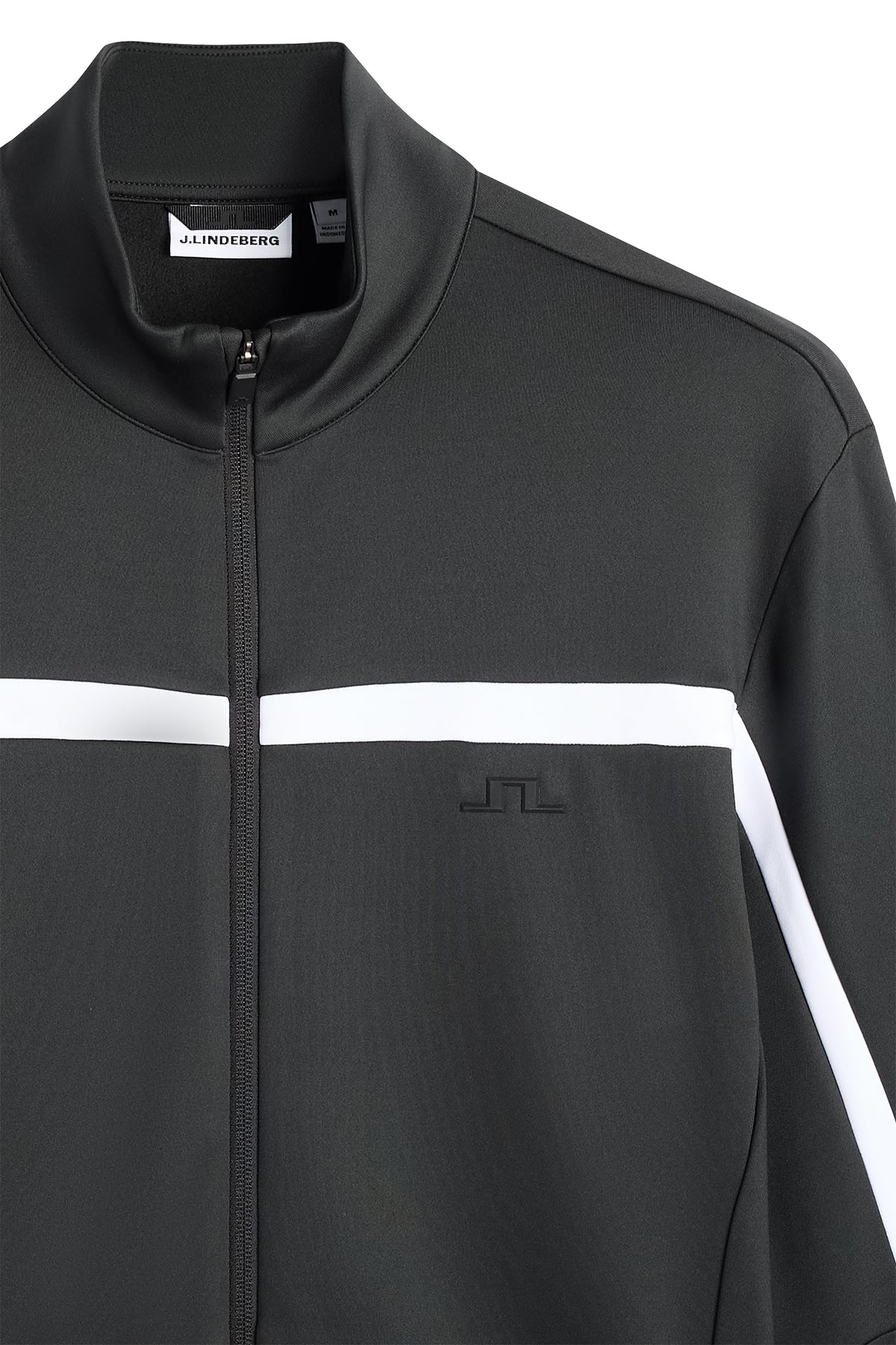 Gros plan : Sharpe Full Zip Mid Layer noir avec bande blanche sur la poitrine et logo Bridge en relief.