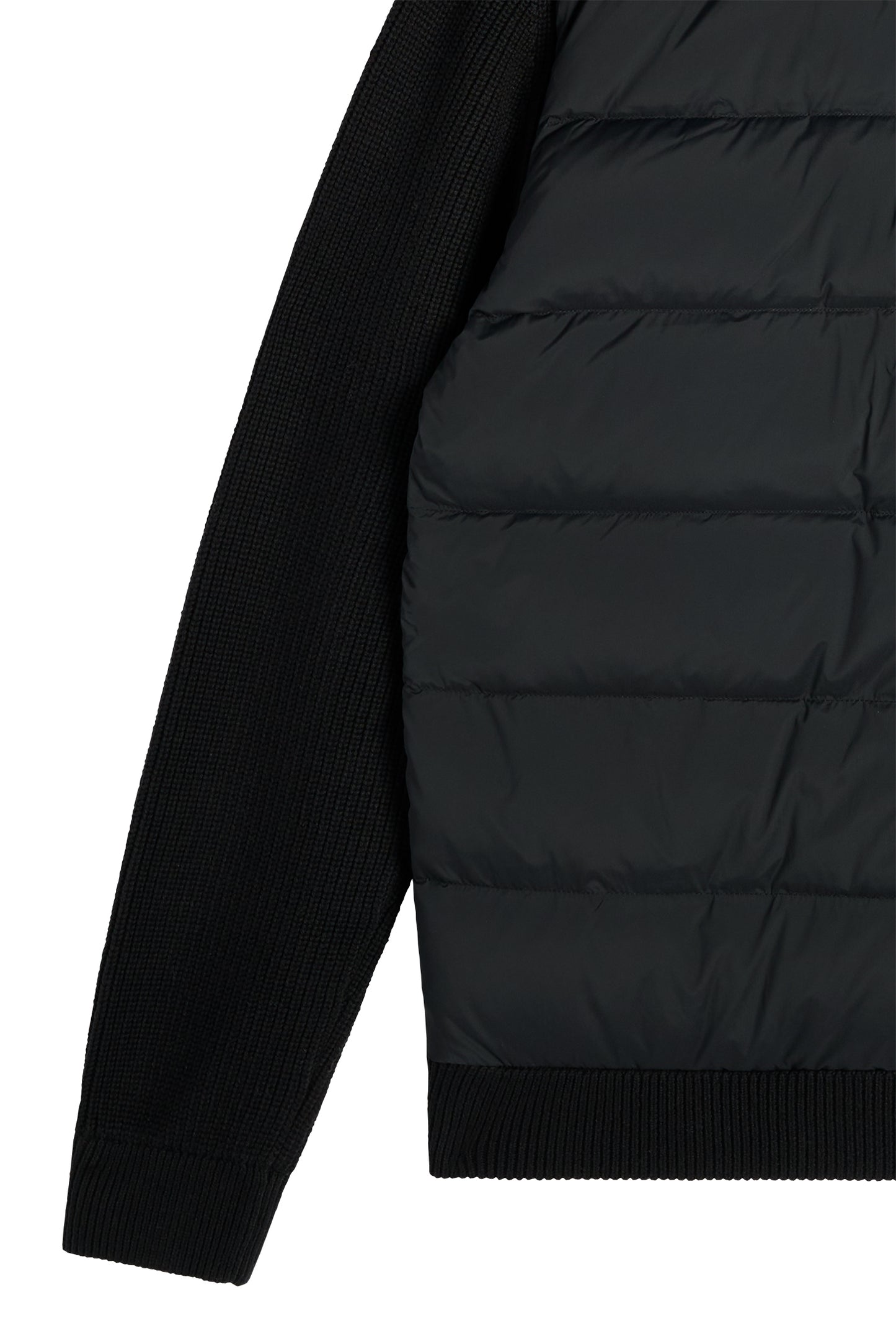 Närbild: Dorin Knit Hood Hybrid Jacket i Black med stickad ärm, quiltad panel och ribbad nederkant.