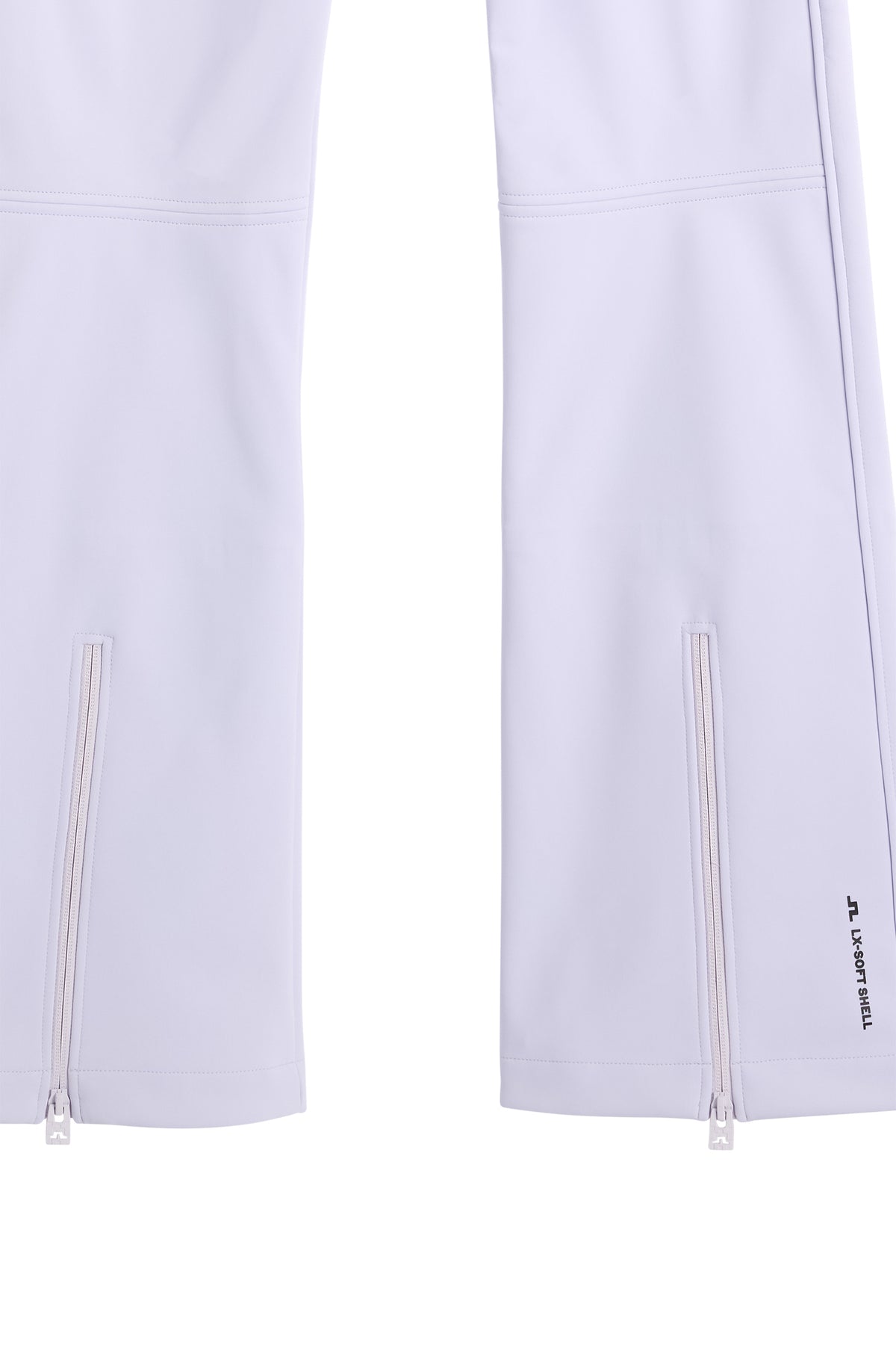 Nærbillede: Stanford Softshell Ski Pant i Purple Heather med lynlåse ved anklerne og Bridge-logo.