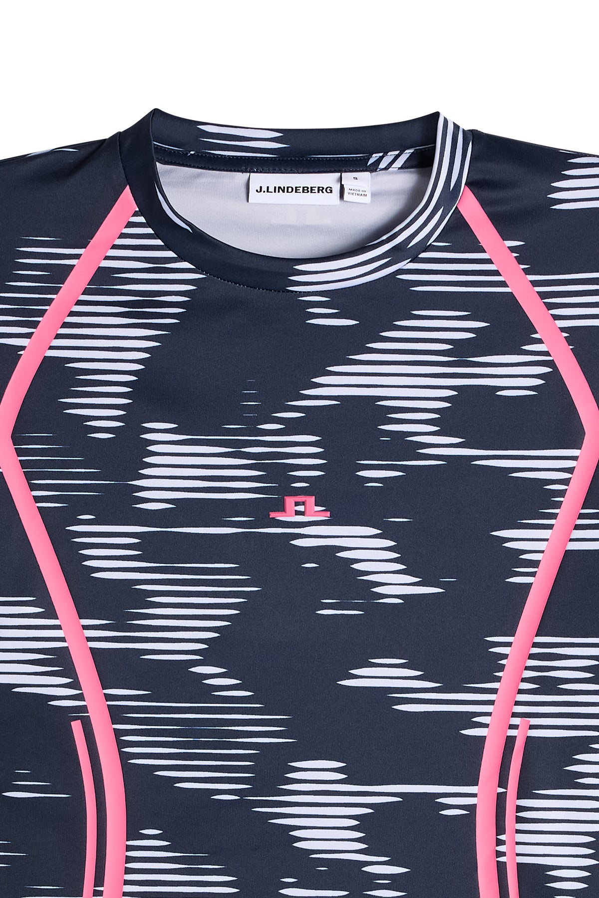 Close-up: Line LS Printed Top met ronde hals, grafische print, roze contrastdetails en Bridge-logo op de borst.