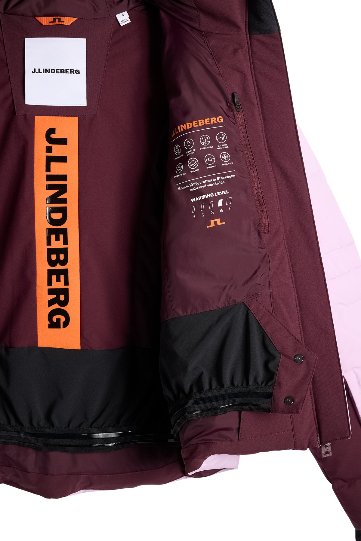 Detailansicht: Nerina Blocked Down Jacket in Winetasting mit Innenfutter, Reißverschlusstasche und integriertem Schneefang.