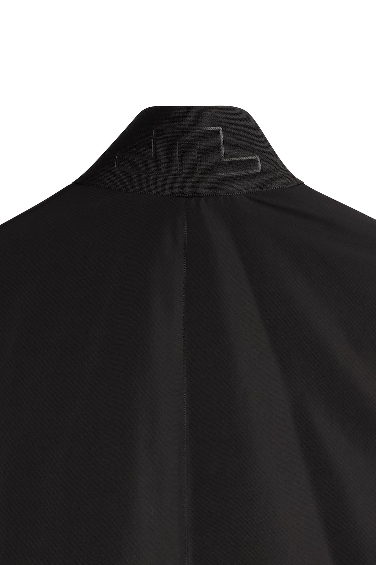 Harold Padded Jacket in black, close-up back view showing the ribbed collar with a tonal Bridge logo.