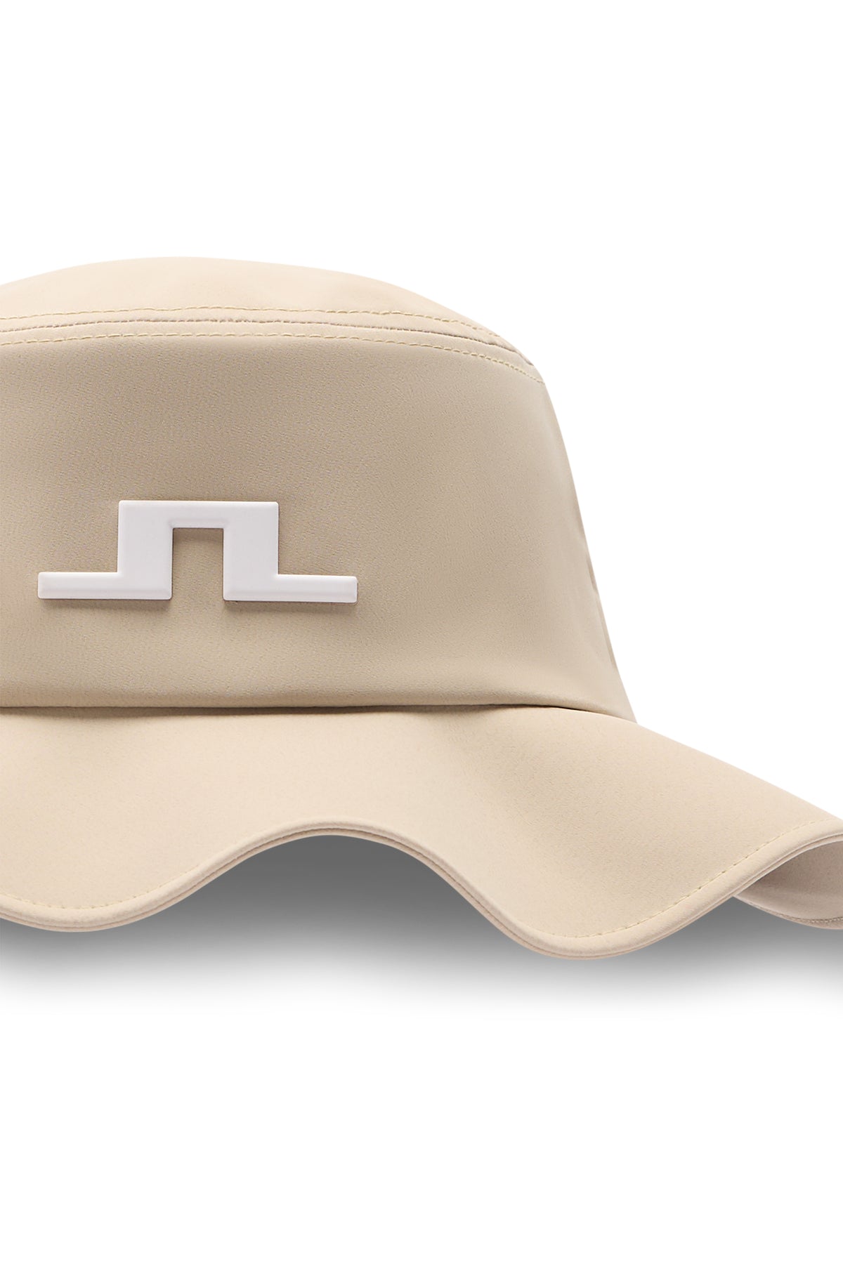 Nærbilde: Tour Flexfit Bucket i Moonbeam med hvit Bridge-logo foran og strukturert brem.