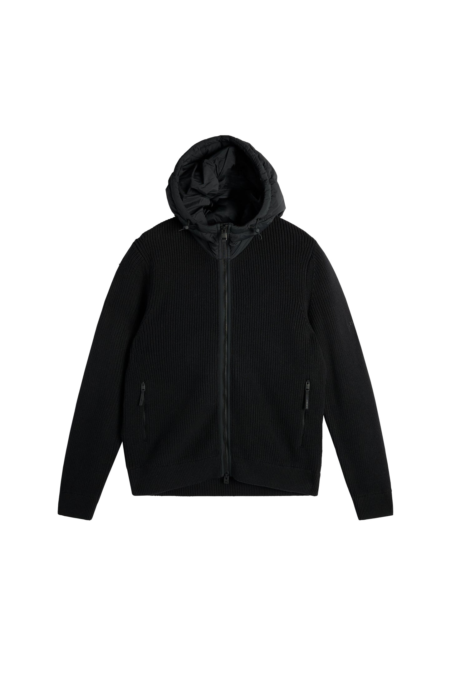 Framifrån: Dorin Knit Hood Hybrid Jacket i svart med stickad struktur, vävd huva och tvåvägsdragkedja fram.