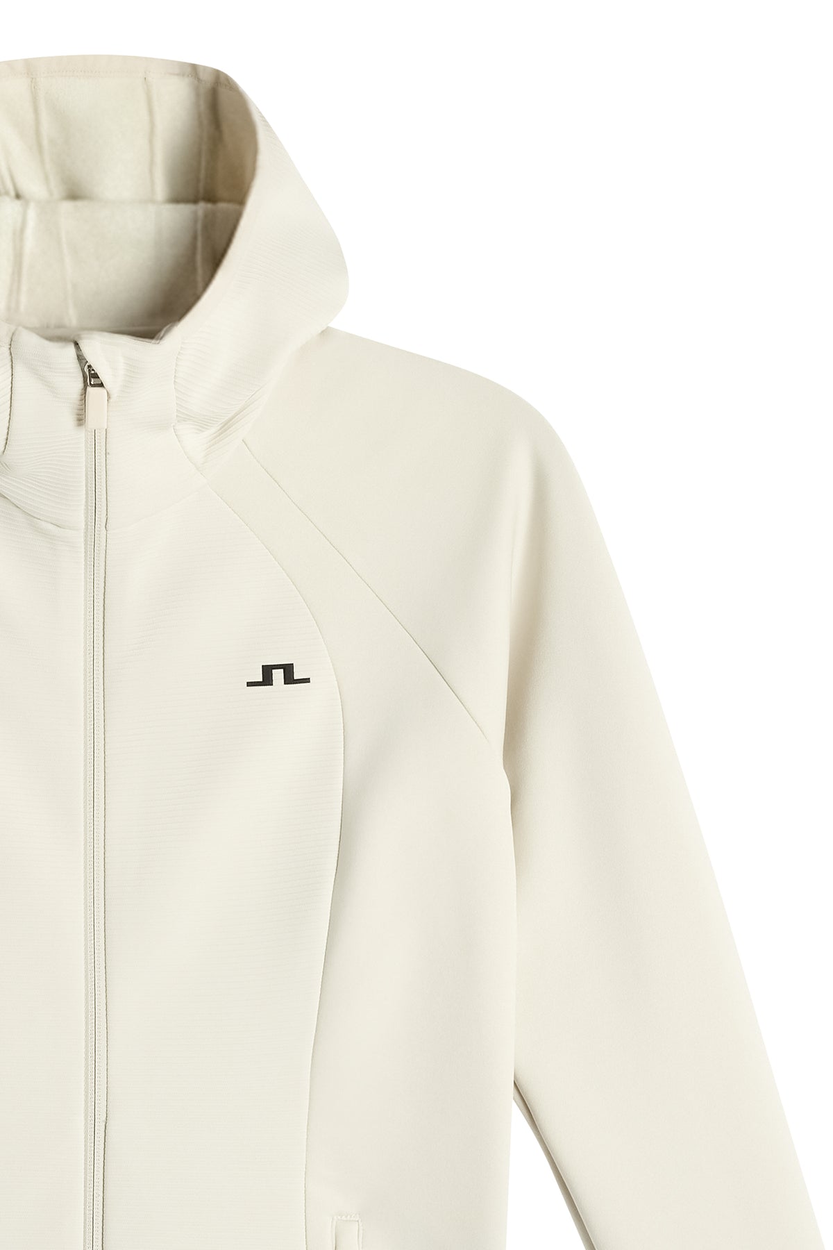 Close-up of the Mireya Full Zip Hood in Moonbeam, showing the hood, zipper, and chest Bridge logo.
