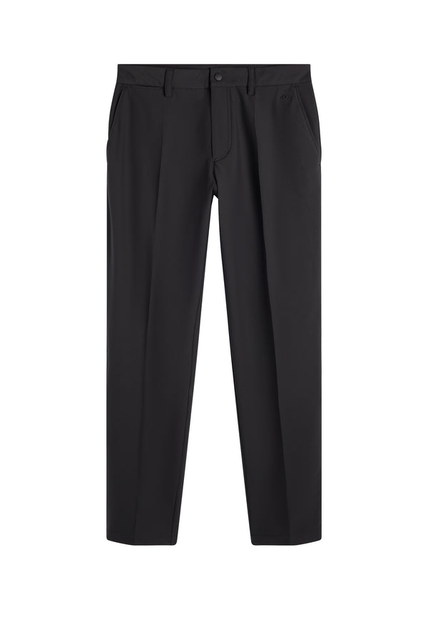 Mitch Stripe Pant in black, front view with belt loops, zip fly, and a subtle Bridge logo.