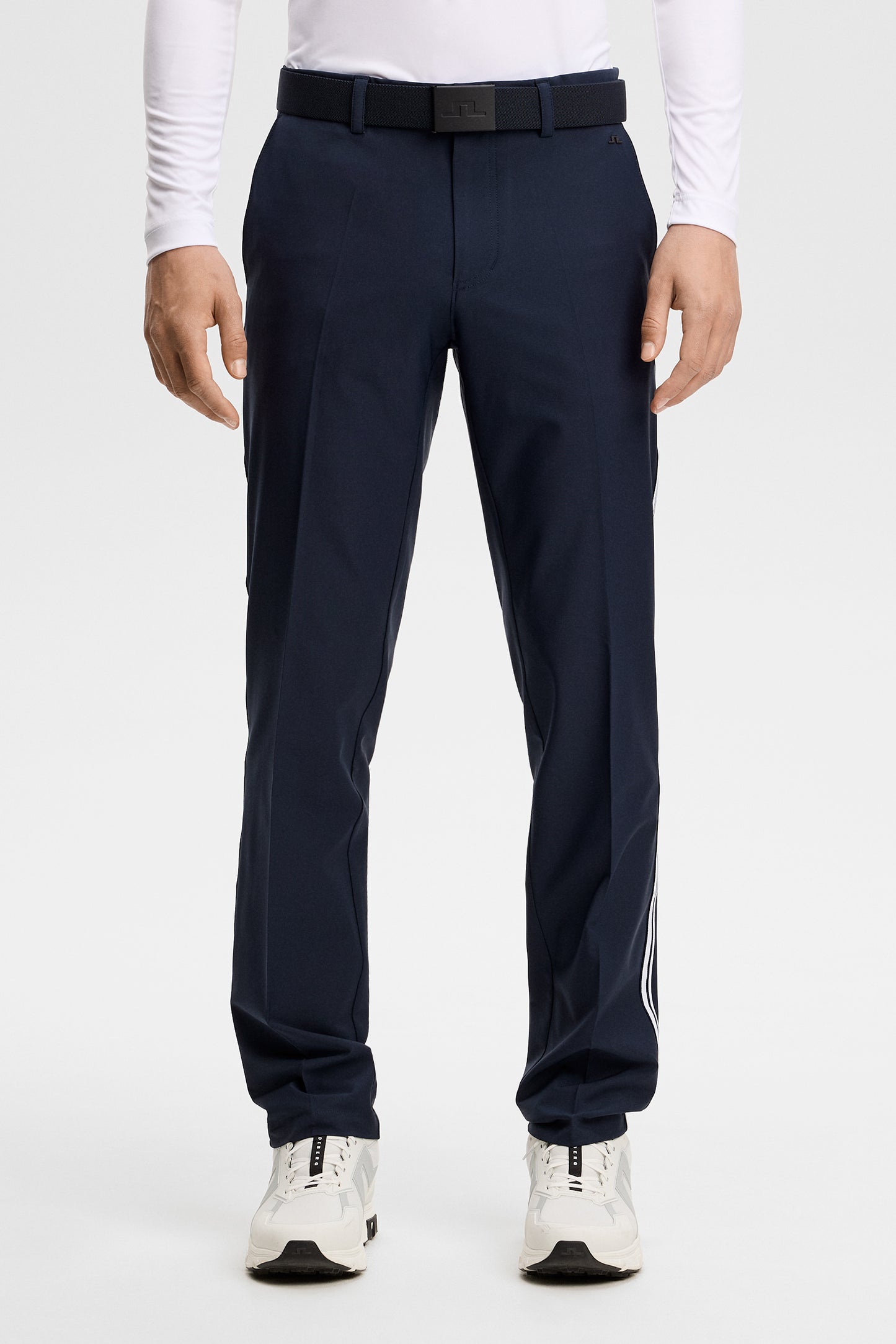 Front view: Mitch Stripe Pant in JL Navy, featuring a slim fit, center creases, and white side stripe tape.