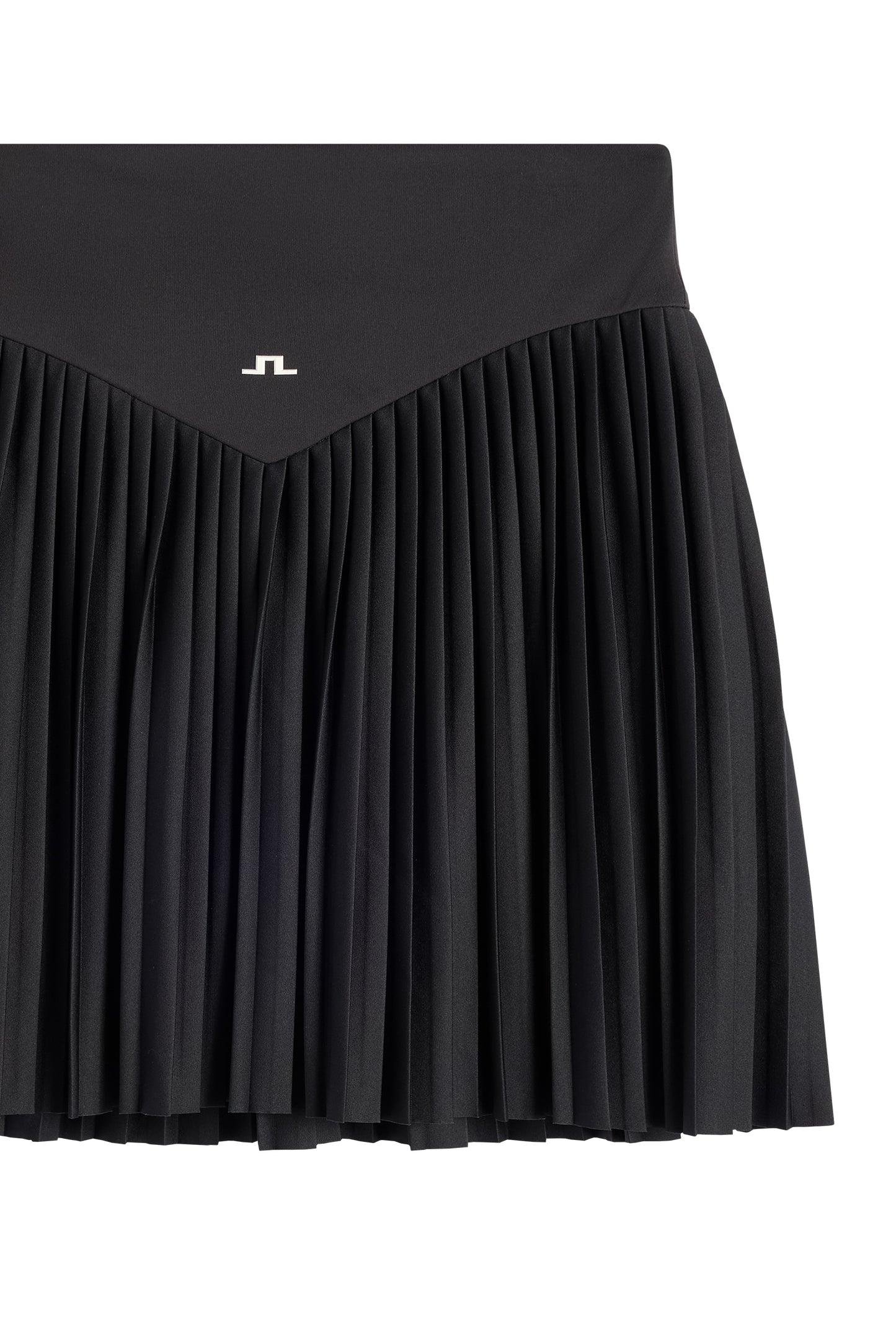 Close-up: Zwarte Alexandra Skirt met geplooide stof en wit Bridge-logo op de tailleband.