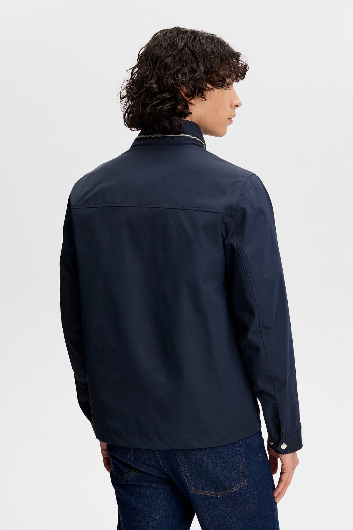 Bailey Recy Poly Jacket in JL Navy, back view showing the zipped stand collar and back yoke seam.