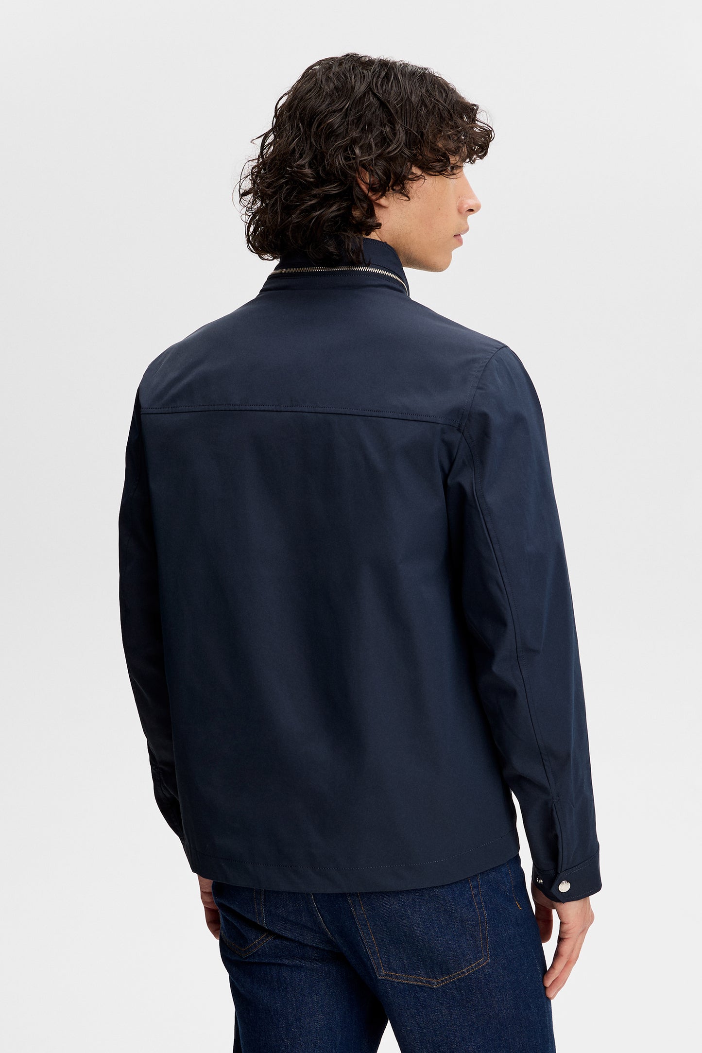 Bailey Recy Poly Jacket in JL Navy, back view showing the zipped stand collar and back yoke seam.