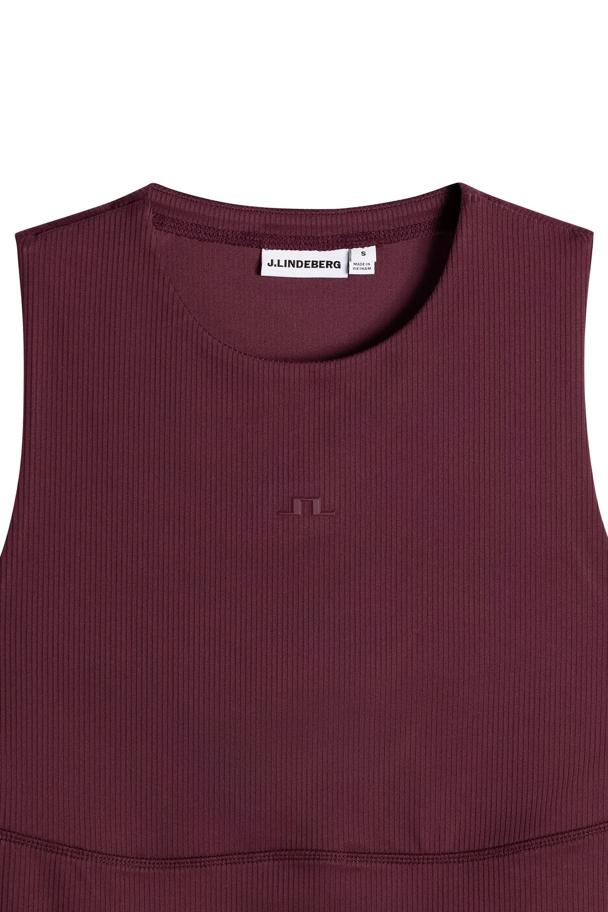 Nærbillede forfra: Vinrød Hannah Sleeveless Top med rund hals, ribstruktur og tonet Bridge-logo på brystet.