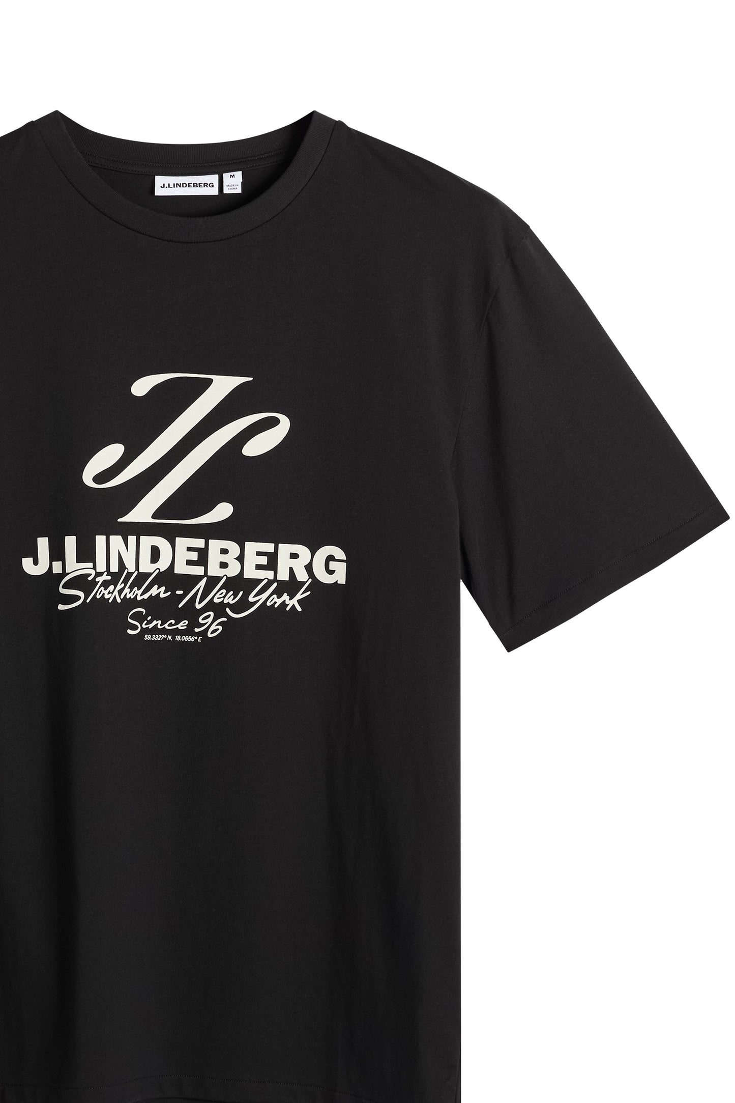 Detail shot: Black Alpha Graphic T-shirt with a crew neck and large white text graphic on the chest.