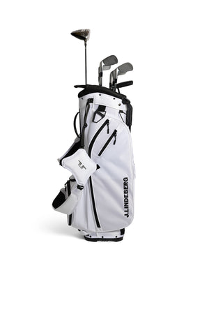 White with black accents and logo golf bag with clubs on a white background